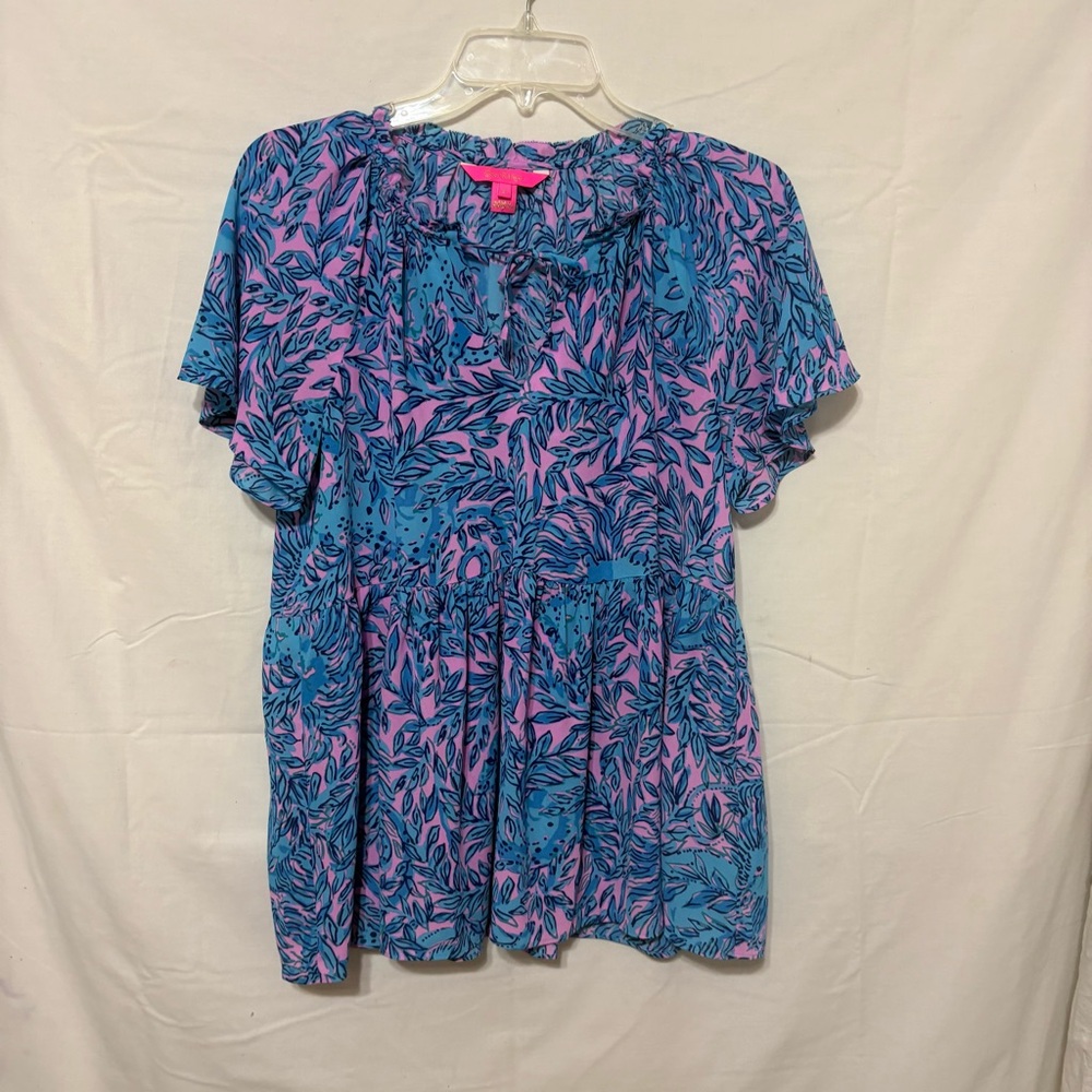 Lilly Pulitzer Zadie top featuring short flutter sleeves and a peplum silhouette